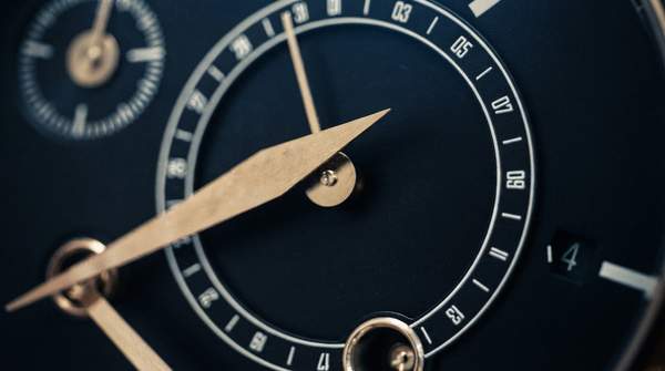 Editorial illustration for Moonphase vs. Perpetual Calendar: How Watchmakers Shrank the Sky Onto the Wrist